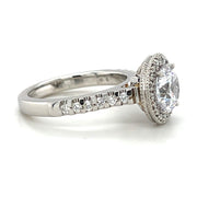 Platinum Die-Struck Diamond Halo Engagement Ring