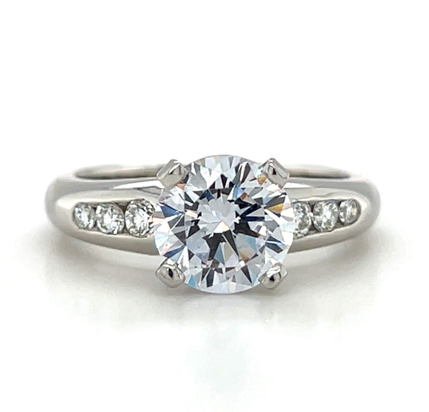 Platinum Die-Struck Channel Set Diamond Engagement Ring